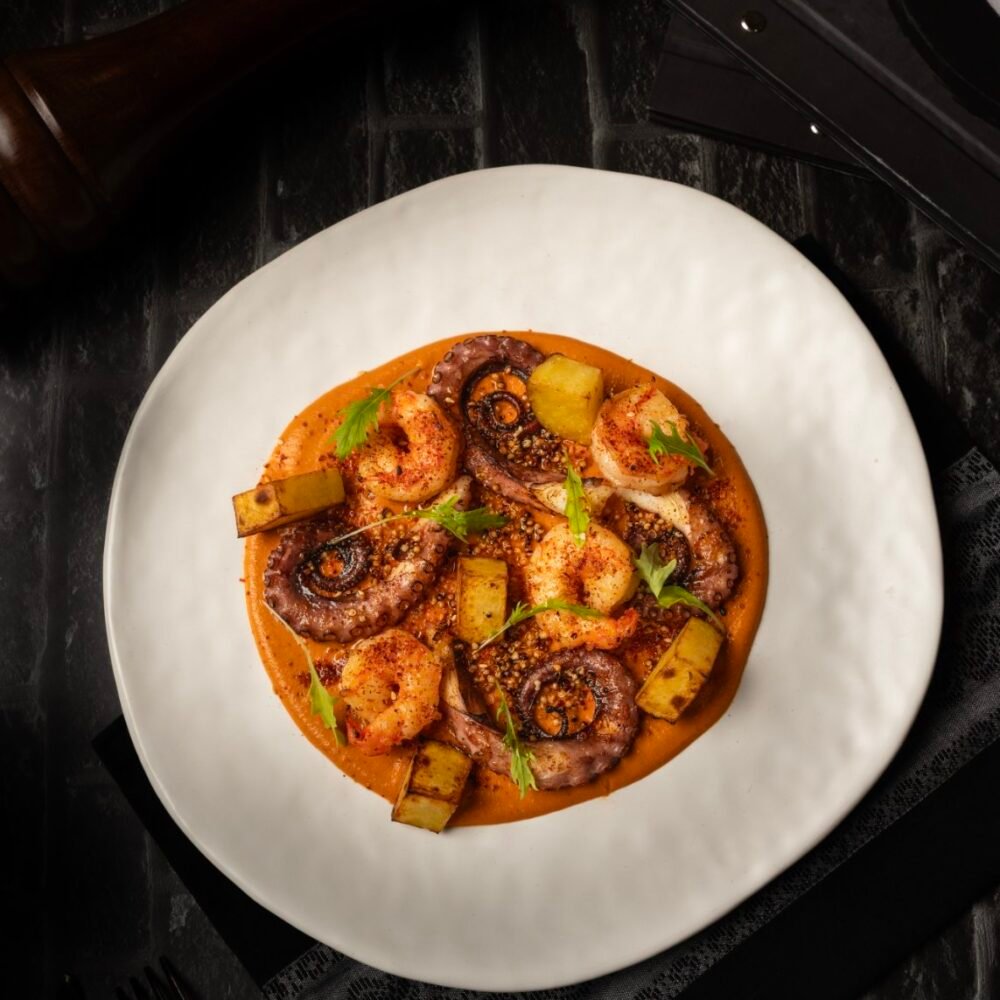 Grilled Octopus & Prawns with Romesco Saue